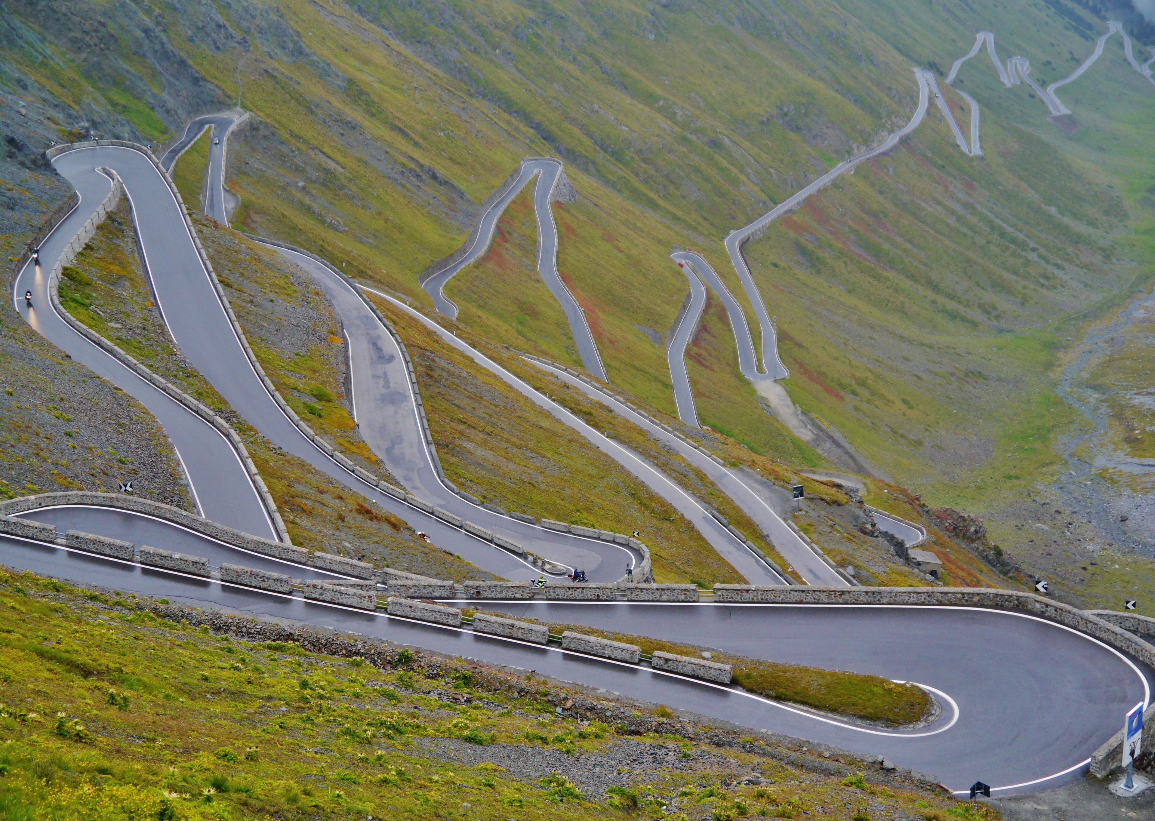 Hairpin bends climbing the open mountainside at the Stelvio Pass