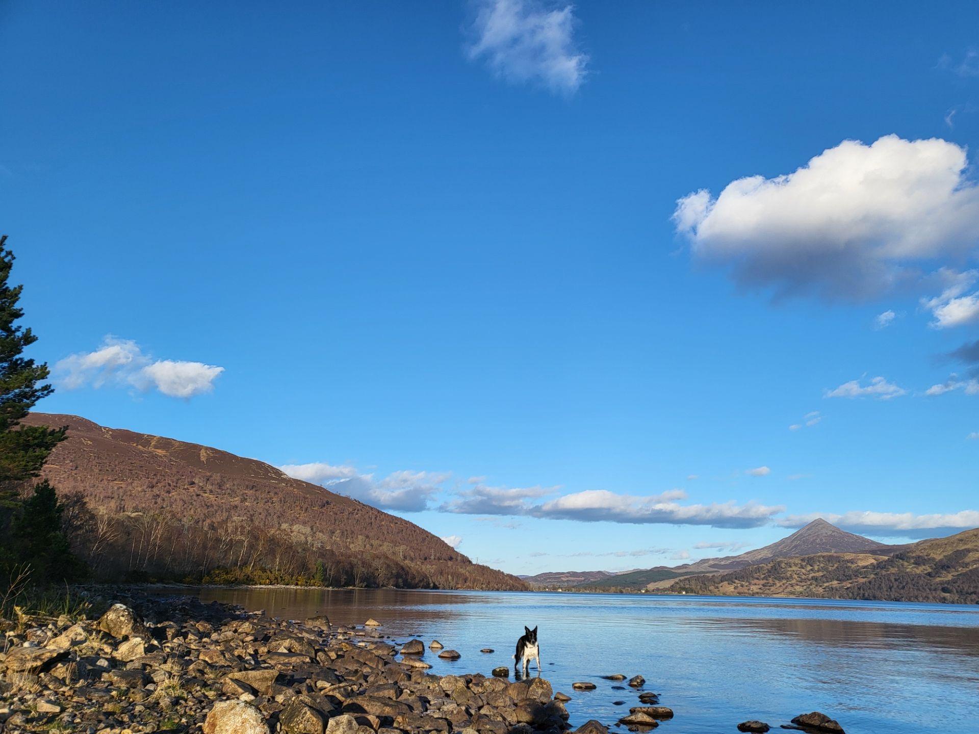 The rocky north shore of Loch Rannoch, with Schiehallion rising across the water